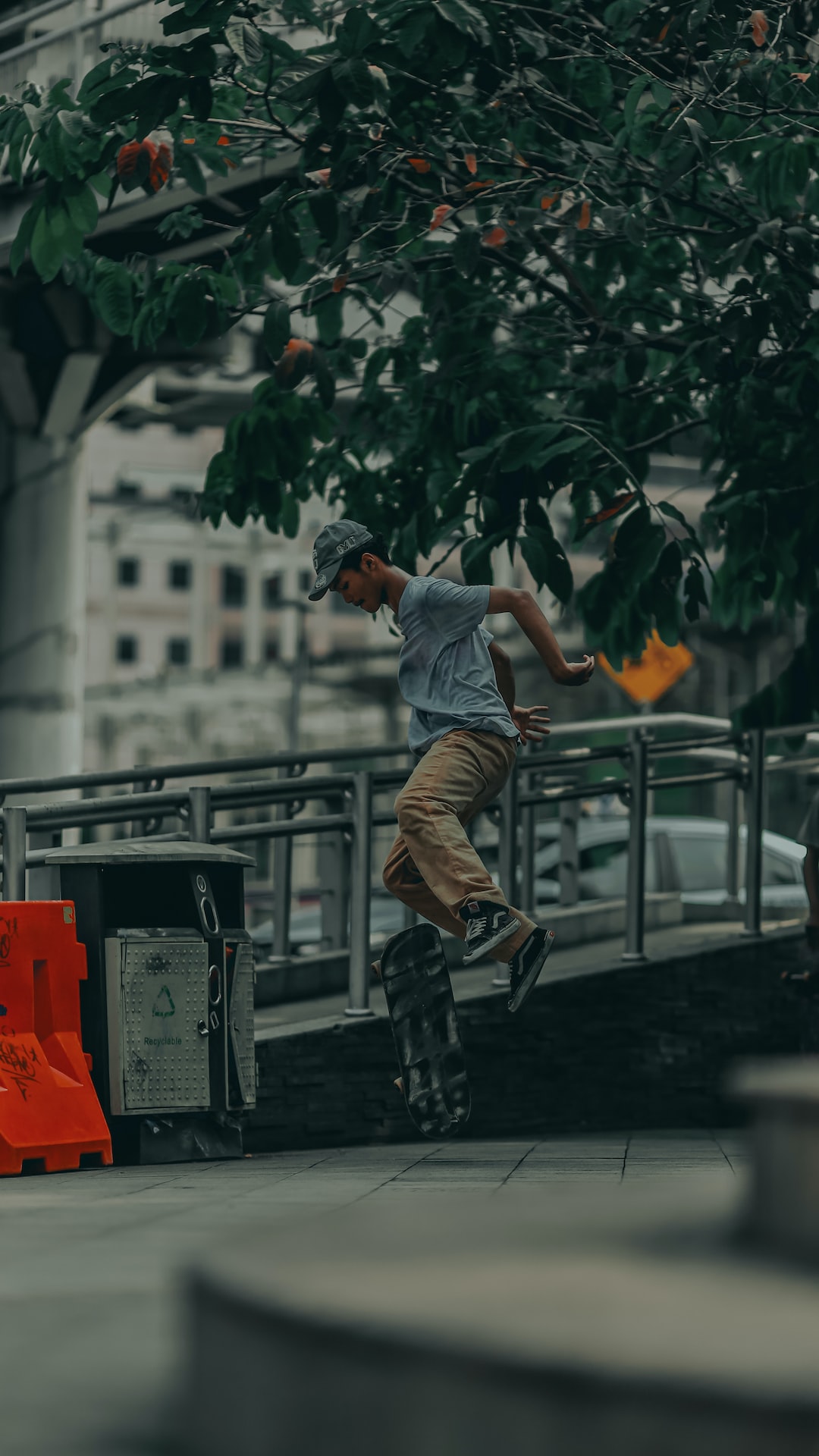 Conclusion by Skateboard Brands a man riding a skateboard down a sidewalk