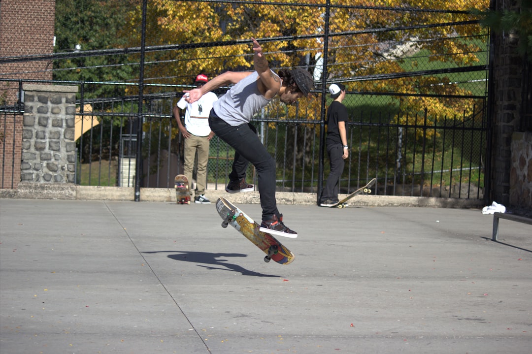 A man flying through the air while riding a skateboard